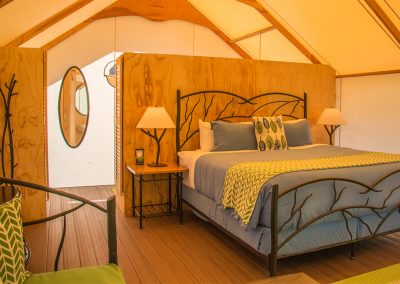 Luxury bed inside yurt wideview