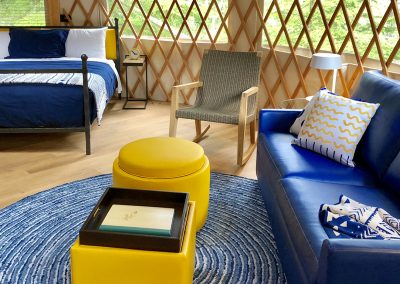 Luxury yurt living room and bed at Lakedales San Juan Island