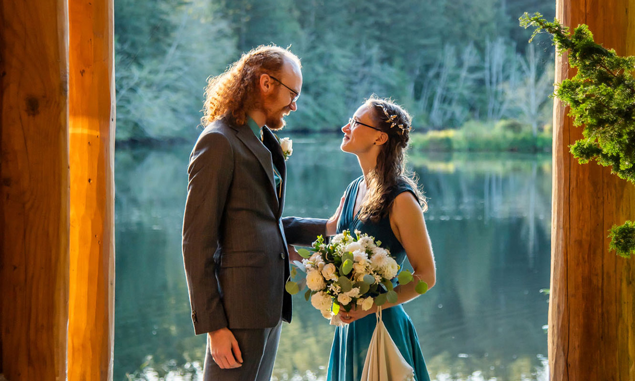 wedding-couple-at-lodge-by-lake